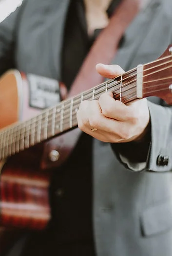 The Odd Sox International band member performing at a private event