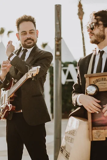 The Odd Sox International band member playing guitar