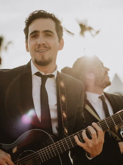 Band members playing among guests