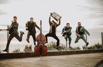 The Odd Sox International band performing live at a high-end event